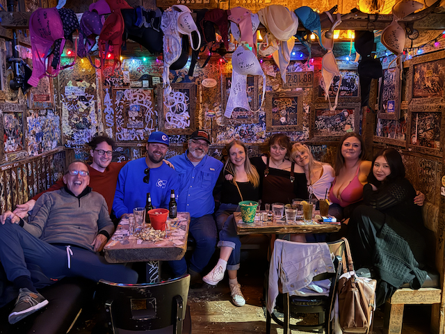 Congratulations to the newly engaged couple sitting on my left.