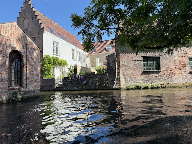 Drifting through Bruges, where every bend of the canal reveals a new postcard. Ancient brick, ivy-covered courtyards, and sunlit waters make this city feel like a story gently unfolding.