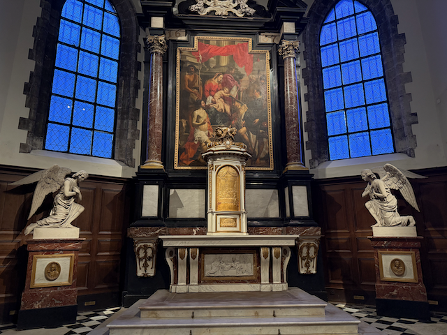 Inside the chapel of the old hospital in Bruges, this beautiful altar stands surrounded by soft blue stained glass and two watchful angels. A quiet reminder that healing here was always about more than just medicine.