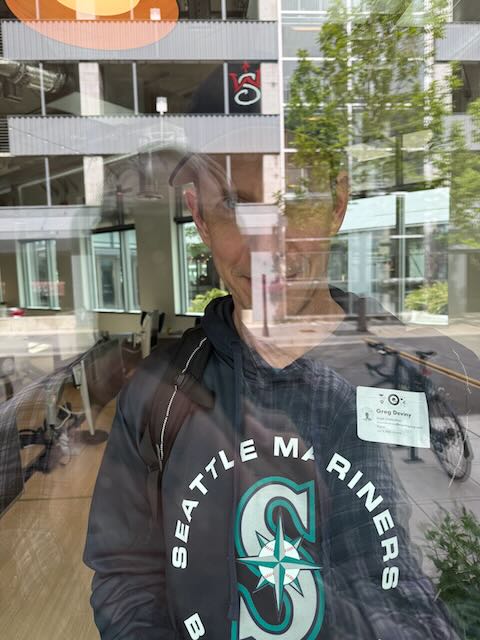 My buddy Greg looking out the window on campus