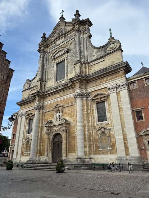 St. Walburga’s Church in Bruges—a Baroque masterpiece built by the Jesuits in the 17th century. Its ornate interior and rich history offer a serene retreat amidst the city’s medieval charm.