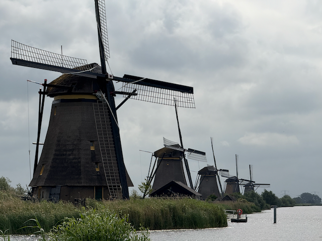 These four windmills were used to pump water half a meter from behind them into this canal.