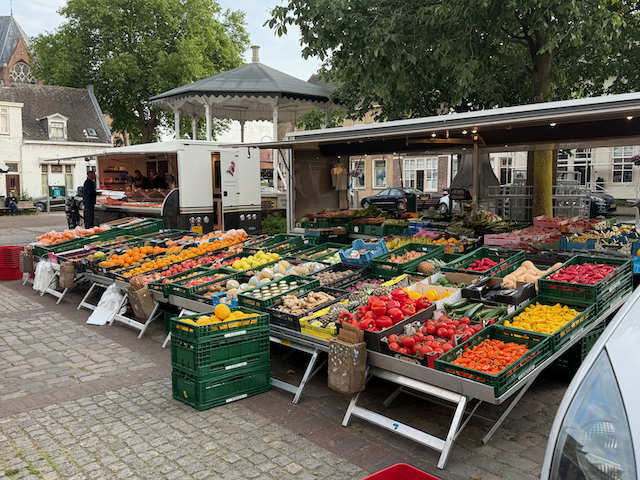 These were pretty cool market rigs in Tholen.  They roll in these trailers into the square and just open up and away they go.